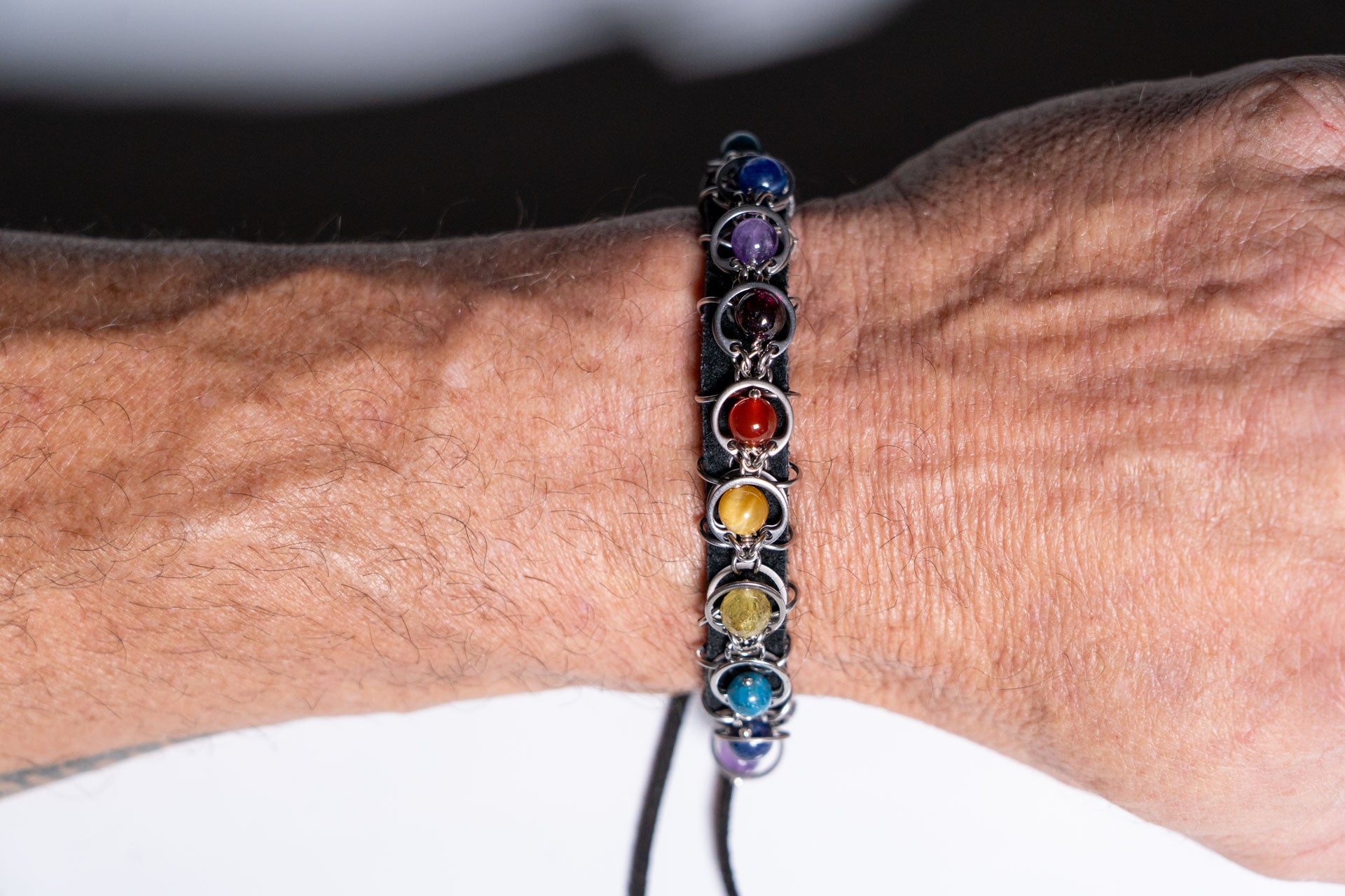 Fourteen‑Stone Chakra Pride Leather Bracelet