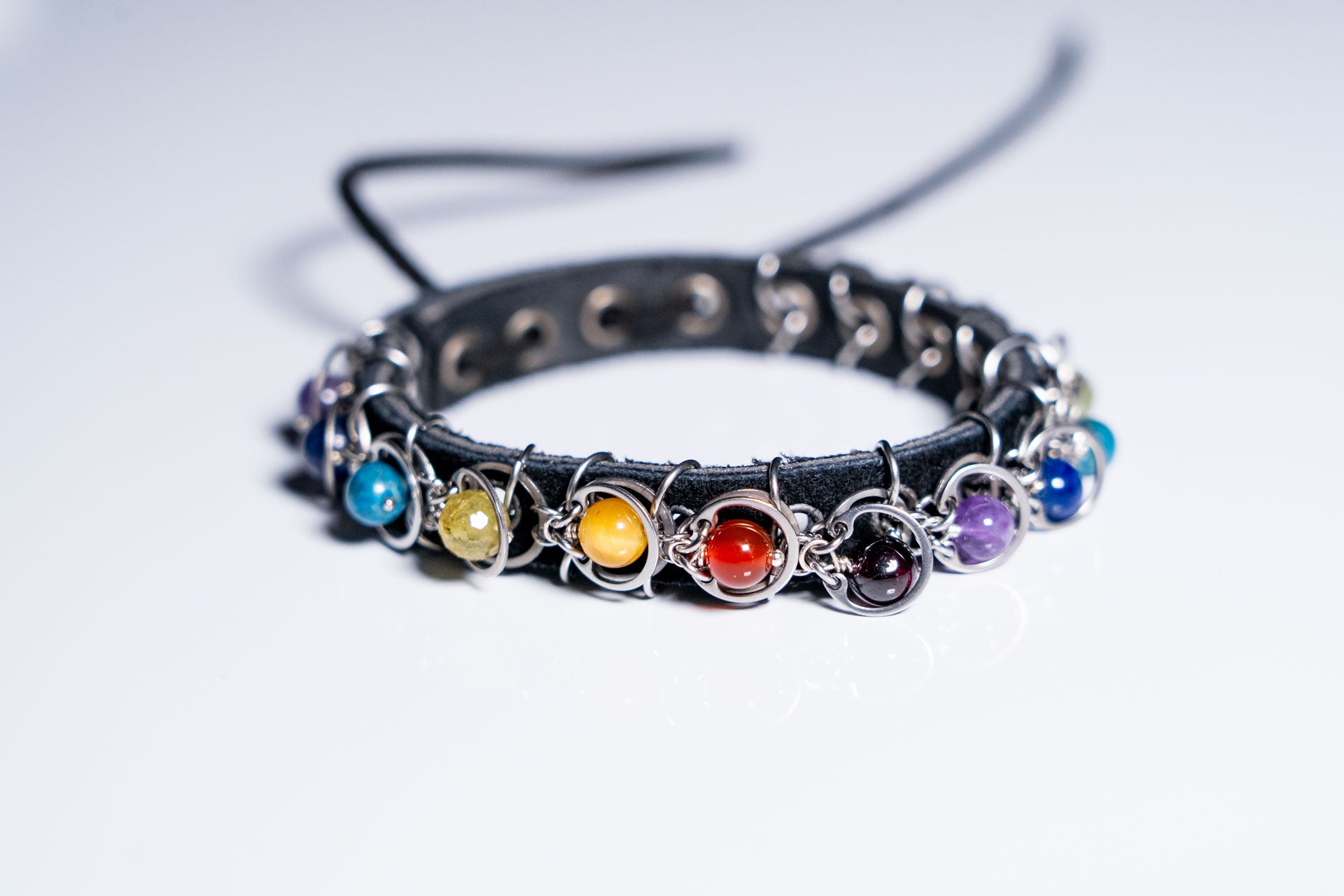 Fourteen‑Stone Chakra Pride Leather Bracelet